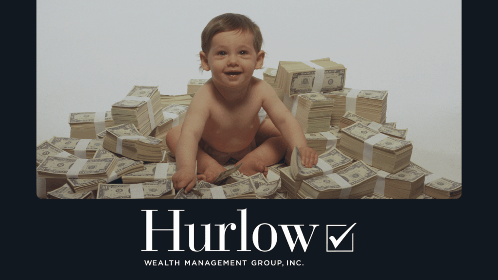 Baby sitting on a pile of money
